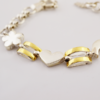 Pulsera de plata con oro